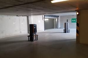 Entrance to the parking lot in the underground garages equipped with terminals