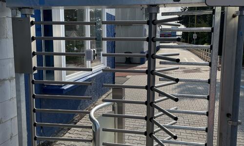 Entrance to the company premises through the external turnstile door