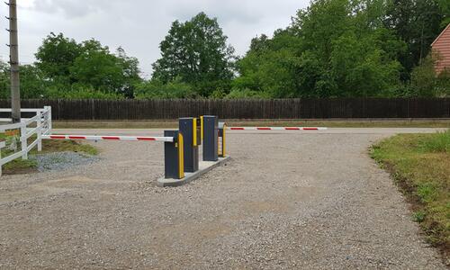 Barriers at the entrance to private land, parking lot and hotel