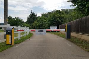 Barriers at the entrance to private land, parking lot and hotel