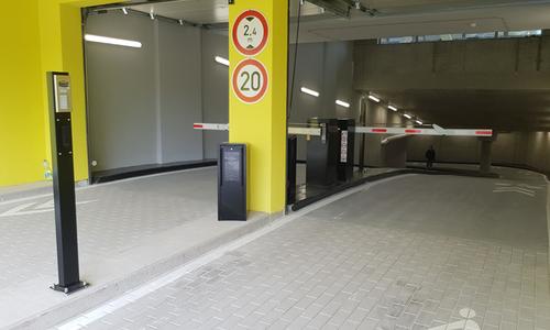 Entrance to office garages with parking barriers