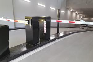 Entrance to office garages with parking barriers