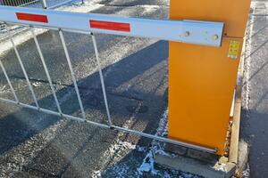 Industrial barriers with shutters at the entrance to the GIBS headquarters