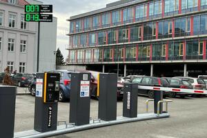 Self-service parking system with license plate recognition